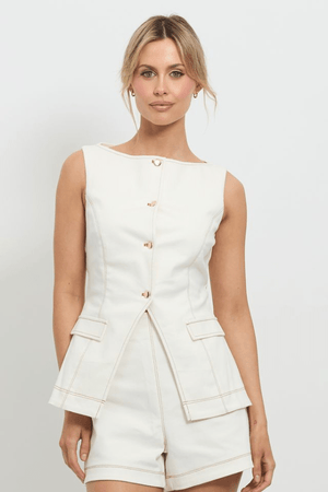 Good Vibes Top White by Pasduchas, stretch denim with contrast topstitching, gold snap studs, and mock pockets, perfect for trendy viral casual and coordinated looks.