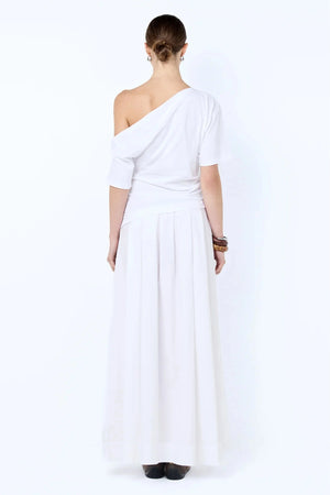 Chantal Off-Shoulder Maxi Dress by Bec + Bridge, this cotton dress features a poplin skirt and jersey bodice. Perfect for summer events.