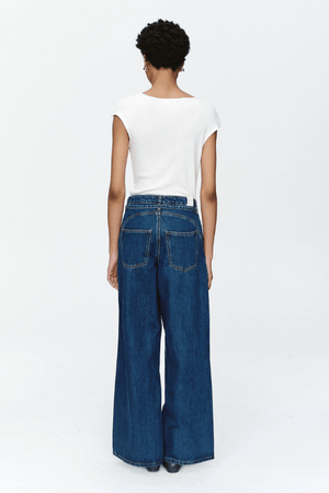 Tie Curve Seam Jean Heritage Blue by Marle, trendy mid-rise jeans with unique curved seam detailing and a relaxed, wide-leg fit. Perfect for a versatile, polished look with a detachable tie belt.