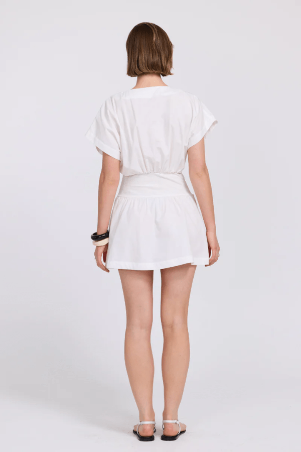 Versed Mini Dress Chalk by Sovere – A trendy and modern mini with a soft lyocell blend, structured contrast waistband, and gathered skirt, perfect for chic day-to-night looks.