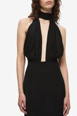 The Capezza Silk Dress by MISHA, a halter midi dress with plunge neckline, silk wrap, and open back. Perfect for elevated evenings.