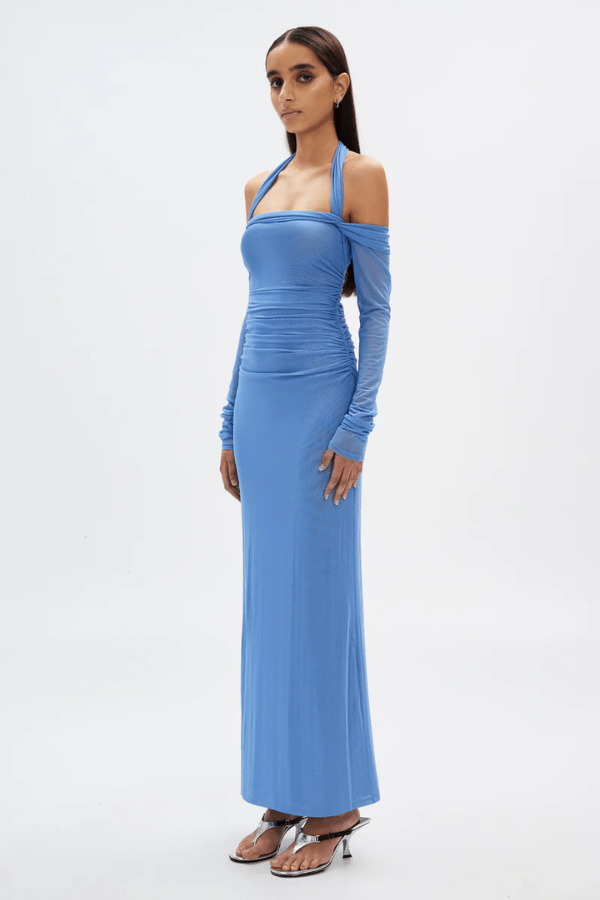 Sonnet Mesh Dress Cornflower Blue by Misha – A trendy off-shoulder, body-skimming maxi with halter neck strap and delicate gathers, perfect for sophisticated nights.