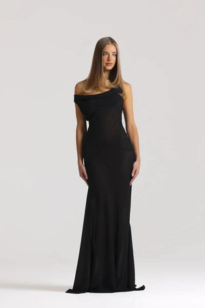 Anita Dress Black by Natalie Rolt featuring a sheer georgette silhouette, draped cowl neckline and asymmetrical skirt godets.