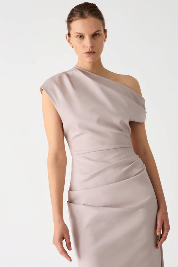 Gia Midi Dress Faded Silver by Misha – Designed in structured sateen, this midi features an asymmetric neckline and pleated shoulder detail.