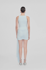Azahar Arctic by Maygel Coronel – A trendy mini dress with memory-shape fit, draped skirt, side sash, and 3D flowers, perfect for chic events and nights out.