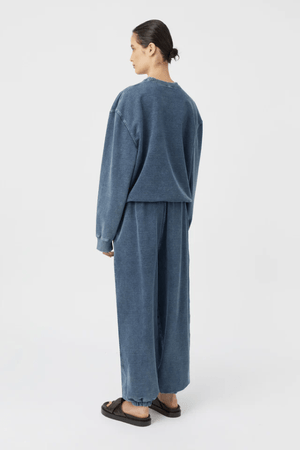 Dovell Crew Indigo by Camilla and Marc, denim fleece with saddle stitching and adjustable hem, perfect for casual days or trendy streetwear layering.