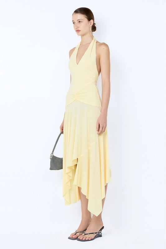 Nessie Halter Dress by Bec + Bridge in yellow stretch jersey with halter neckline, low back, and asymmetric midi hem.