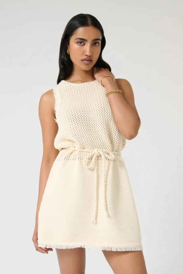 Jana Dress – Ivory by Onte, contrast-knit mini with fringe and rope tie. Perfect for summer days or elevated resort styling.