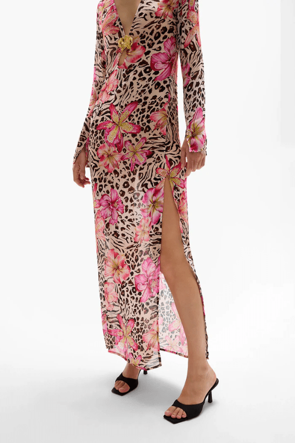 Hotline Orchid Maxi Dress Safaria by Cin Cin – Trendy and bold, this maxi features vibrant floral and animal prints, semi-sheer viscose, and a sultry keyhole bust. Perfect for beach-to-bar days and warm evenings.