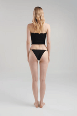Atarraya Black by Maygel Coronel, sculpted fit with two handmade knots and elegant draping, perfect for trendy viral looks that highlight your silhouette.