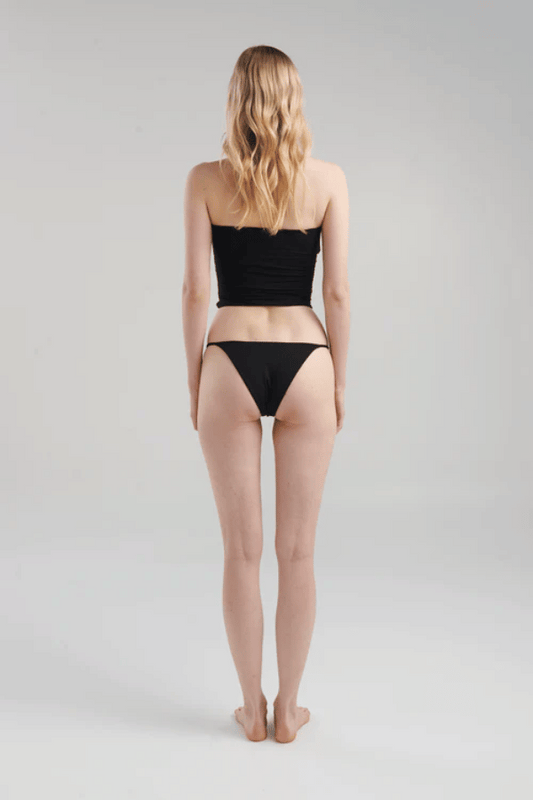 Atarraya Black by Maygel Coronel, sculpted fit with two handmade knots and elegant draping, perfect for trendy viral looks that highlight your silhouette.