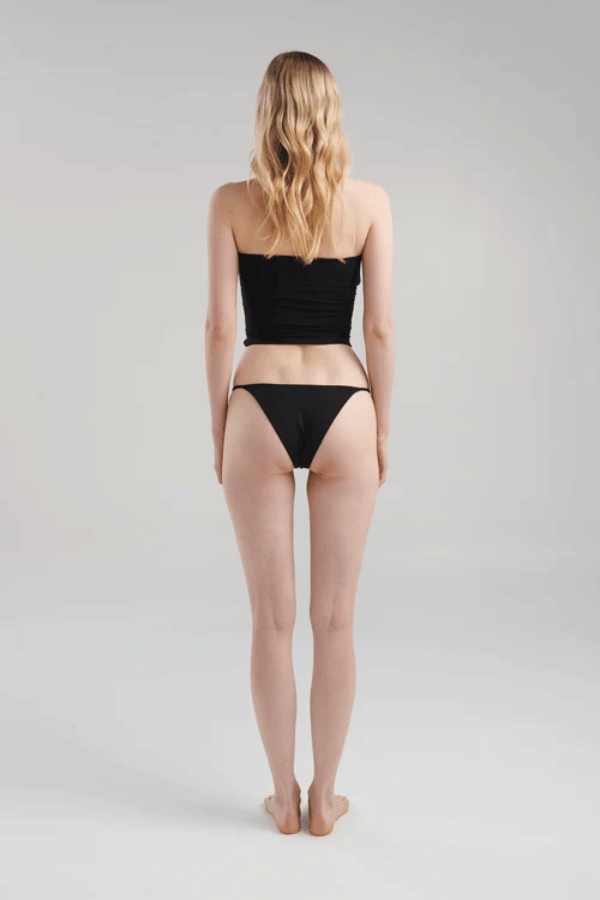 Atarraya Black by Maygel Coronel, sculpted fit with two handmade knots and elegant draping, perfect for trendy viral looks that highlight your silhouette.