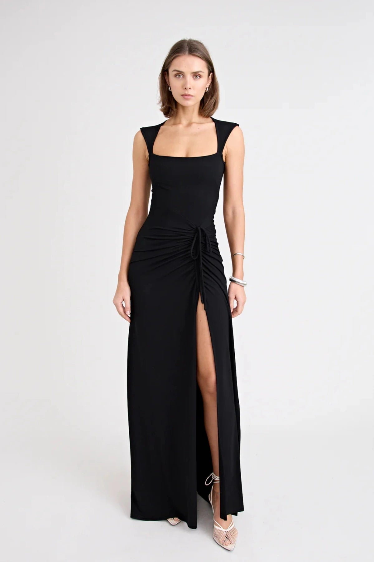 Samara Dress by Pfeiffer — a full-length jersey dress with a square neckline and adjustable front split, perfect for elegant occasions.