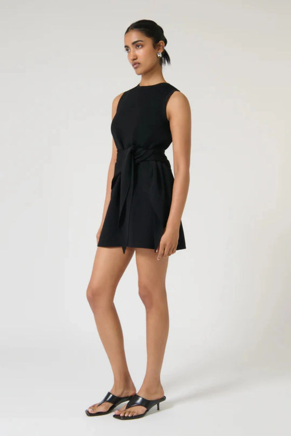 Elodia Dress – Black by Onte, a sleeveless crepe knit mini with a scarf belt. Perfect for day-to-night wear or elevated everyday style.