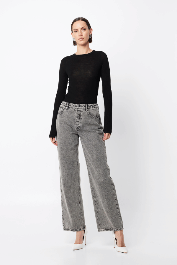 Maine Long Sleeve Top Black by Mossman – A viral, lightweight Merino wool essential with a sleek round neck and body-skimming fit, perfect for year-round layering or solo wear.