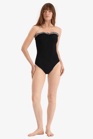 Dolly Bandeau Swimsuit Black by Hunza G – Strapless one-size swimsuit with ruched neckline and gingham texture for timeless poolside elegance.