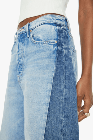Pipe Dream Button Sneak Fray in Blinded By The Dark by MOTHER, Super high-rise rigid jeans with barrel-leg fit and frayed hem for vintage-meets-modern style.