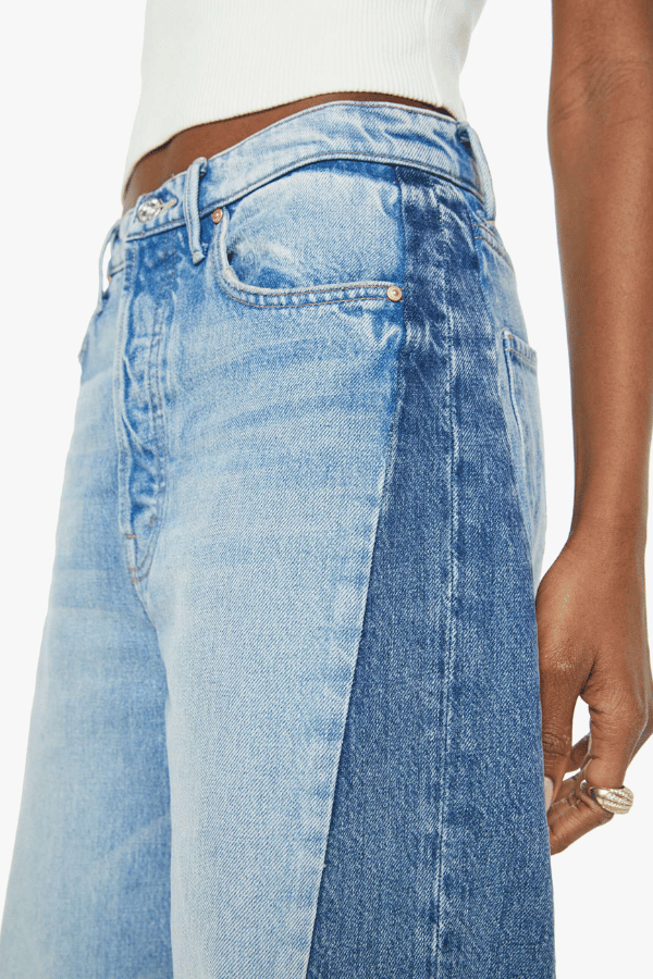 Pipe Dream Button Sneak Fray in Blinded By The Dark by MOTHER, Super high-rise rigid jeans with barrel-leg fit and frayed hem for vintage-meets-modern style.