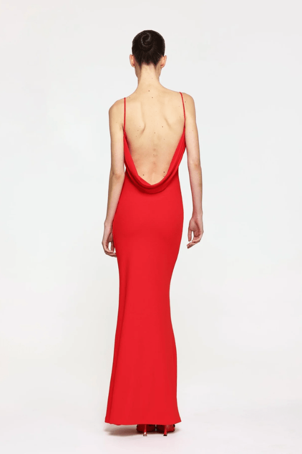 Havilland Gown Cherry Red by Effie Kats – A trendy, fitted gown with delicate ruching and a draped low back, crafted from stretch crepe for elegant special occasions.