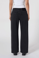 Daria Baggy in French Black by Neuw Denim, relaxed mid-rise fit with comfort stretch and polished straight-leg style. Perfect for daily wear.