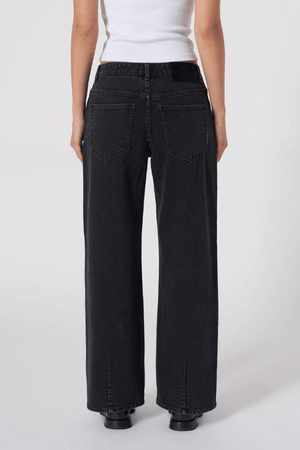 Daria Baggy in French Black by Neuw Denim, relaxed mid-rise fit with comfort stretch and polished straight-leg style. Perfect for daily wear.