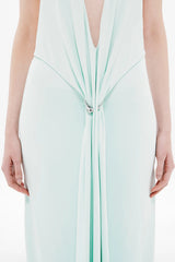 Unity Jersey Dress by Misha, a plunge-neck maxi with soft jersey drape and hardware sash. Perfect for elegant nights and formal occasions.