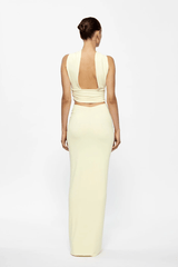 Cassidy Top Lemon by Effie Kats — A fitted, ruched silhouette crafted from soft stretch jersey for comfort and style. Perfect for layering or standalone wear.