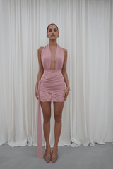 Chrissy Pink by Deconduarte – Trendy two-piece stretch lace set with fitted dress, dramatic over-belt skirt, and daring open back, perfect for bold, elegant formal events.
