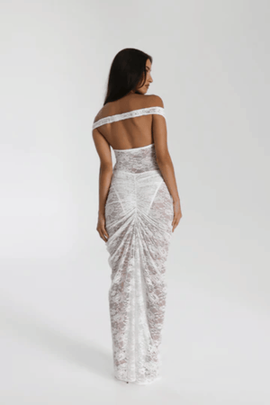 Aubrey Dress White by Natalie Rolt – Elegant lace two-piece with off-shoulder detail and cut-outs, perfect for modern brides or special soirées.
