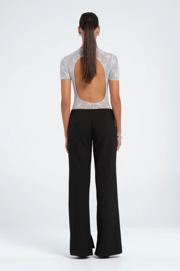 Porter Bodysuit Blue by Benni — Stretch lace bodysuit with high neck, soft jersey lining, open back with hook-and-eye closure, G-string panty, and snap crotch for sleek, practical style.