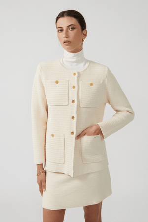 Helena Jacket Ivory by Onte – Breathable 100% cotton crochet-knit jacket with loose fit, gold buttons, crew neck, long sleeves, and patch pockets. Hand wash cold, dry flat.