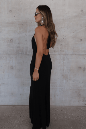Saint Plunge Maxi Dress Black by Sneaky Link – A trendy halter neck maxi with a bold plunging neckline, silky cupro fabric, perfect for elegant nights and viral occasions.