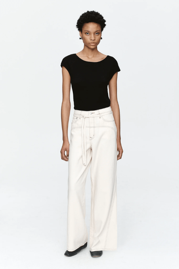 Tie Curve Seam Jean Ecru by Marle, trendy mid-rise jeans with unique curved seam detailing and a relaxed, wide-leg fit. Perfect for a versatile, structured look with a detachable tie belt.