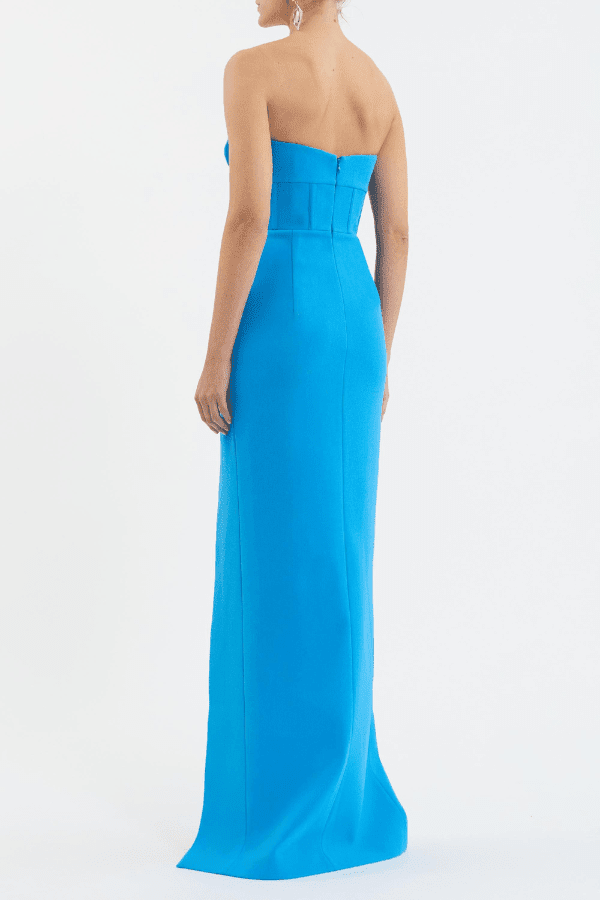 Skyla Gown Bright Blue by Rebecca Vallance – Viral strapless sweetheart gown with corseted waist and front slit, combining elegance and allure for standout formal occasions.