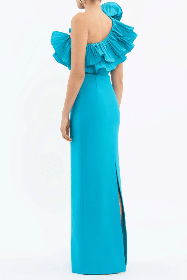 Ella Gown Blue by Rebecca Vallance – Crepe one-shoulder gown with applique neckline, cinched waist, back split, side zip.