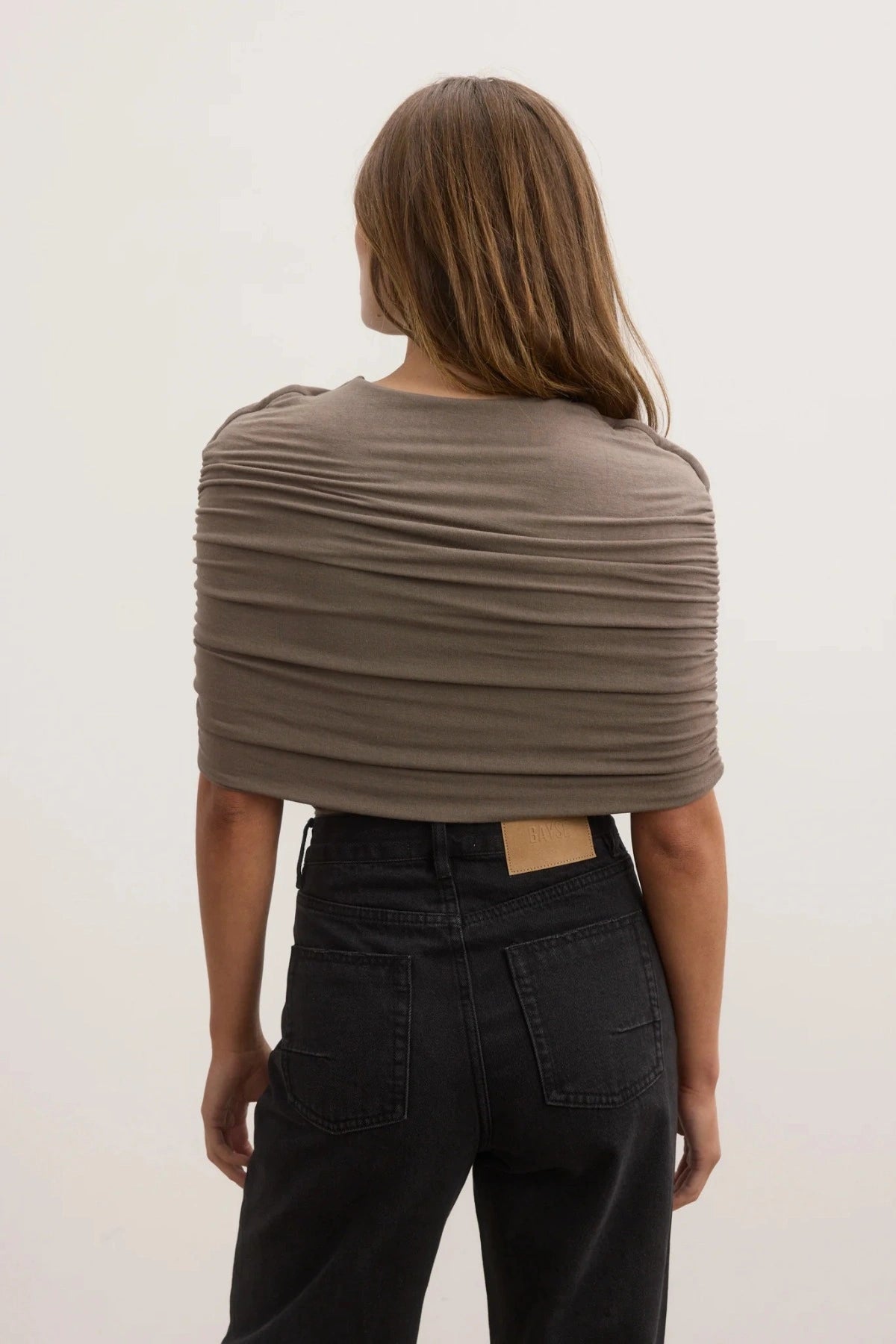 Bayse Daisy Bodysuit in Mink, a sculpted stretch-fit design with high neckline and all-over ruching for a sleek finish.