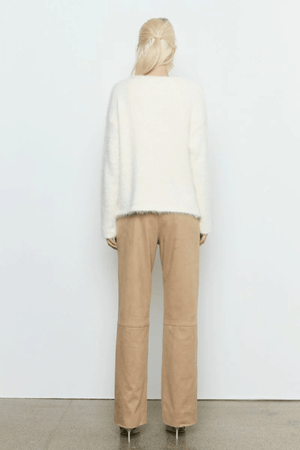 Sabado Combo Knit Cream by Sovere – Trendy two-piece knit set with a fluffy V-neck sweater and ribbed tank, perfect for layering in casual or chic looks.