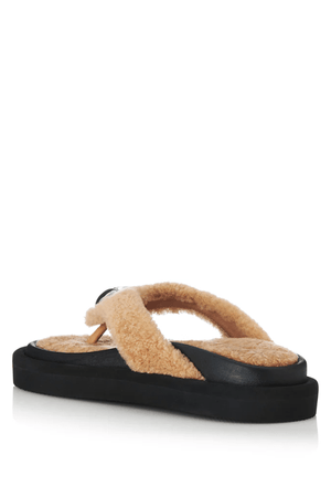 Ana Fawn Shearling by Alias Mae, a chic thong sandal in 100% leather with a soft shearling finish and silver heart detail. Features a 3.5cm heel for subtle elevation and all-day comfort. Size up if in between.