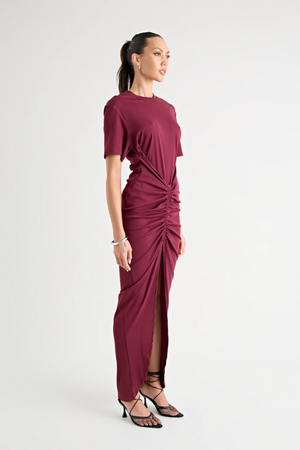 Niko Maxi Dress Burgundy by Pfeiffer – Trendy relaxed T-shirt maxi with adjustable side ruching, crew neck, and breathable cotton blend, perfect for elevated off-duty style and everyday comfort.