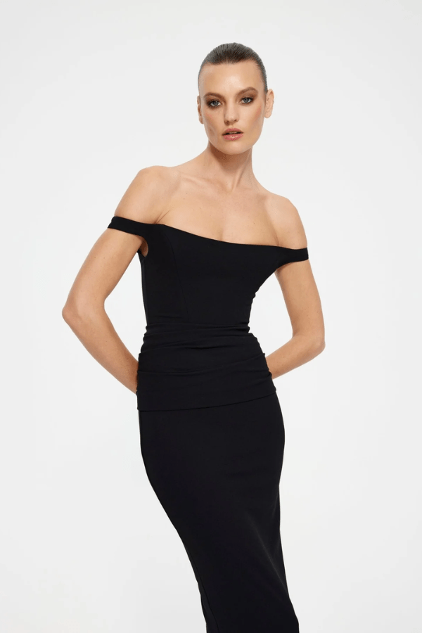 Hayward Gown Black by Effie Kats – An off-shoulder stretch-crepe gown with all-over ruching and a back split, perfect for black-tie events, red carpet moments, or evening galas.