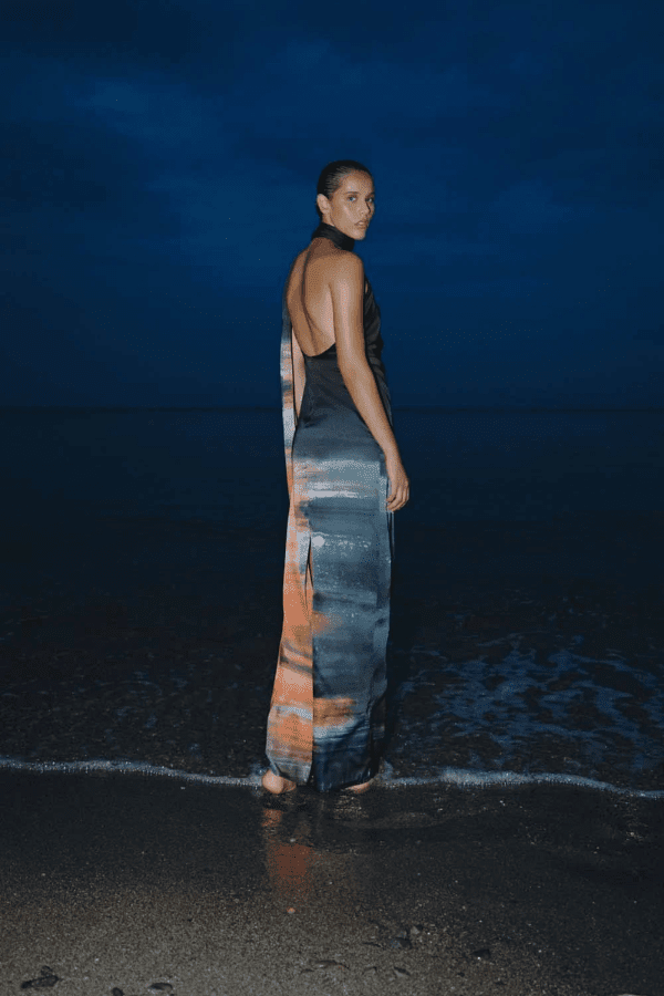 Ari Dress Tigre by Baobab – A bold, elegant one-shoulder maxi with ruched texture and scarf accent, perfect for making a trendy statement at evening events.