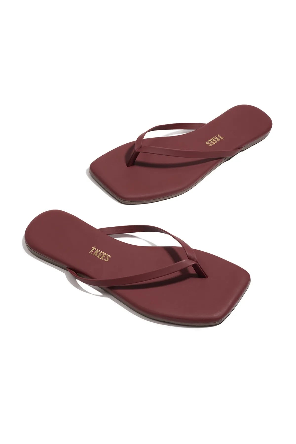 Tkees red suede sandal with clean modern lines, leather insole, and square-toe silhouette, handcrafted in Brazil.
