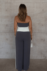 Hunter Tube Top Steel/Ivory by Sneaky Link – Sleek strapless top with contrast neckline and ruched sides. Perfect for trendy coordinated looks and viral summer vibes.