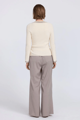 Aimee Combo Contrast Cardi Cream by Sovere – Two-piece knit set with a fitted racer tank and coordinating wide V-neck cardigan with button closure. Soft viscose blend, model wears size 8.
