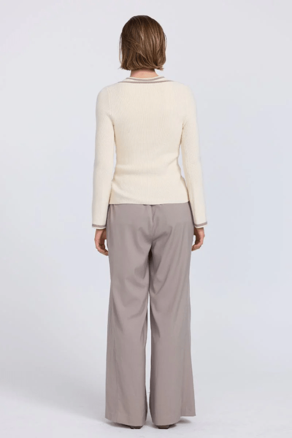 Aimee Combo Contrast Cardi Cream by Sovere – Two-piece knit set with a fitted racer tank and coordinating wide V-neck cardigan with button closure. Soft viscose blend, model wears size 8.