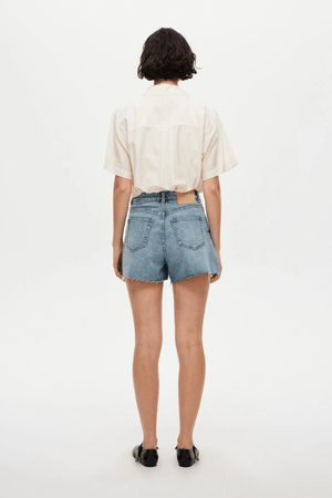 Ryder Short Cosmic by Neuw Denim, a trendy high-rise short with a flattering silhouette, contrast stitching, and signature repair stitch. Perfect for all-season, sustainable style.