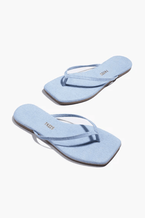 Square Toe Lily Washed Denim by Tkees, a square-toe slide sandal in soft washed denim with a cushioned denim insole and rubber outsole. Handcrafted in Brazil for comfort and style.