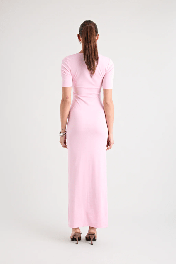 Florence Dress Pink by Pfeiffer – A trendy fitted maxi with cut-out hardware accents, crafted from soft cotton-spandex. Perfect for chic, ethical day-to-night wear. Made in Australia with care.