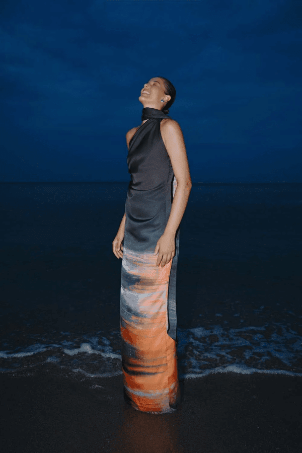 Ari Dress Tigre by Baobab – A bold, elegant one-shoulder maxi with ruched texture and scarf accent, perfect for making a trendy statement at evening events.