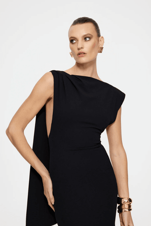 Audrey Gown Black by Effie Kats – A stretch-crepe gown with a straight neckline and dramatic low back, perfect for black-tie affairs, red carpet moments, or elegant evening events.